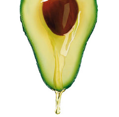 Avocado with oil dripping down