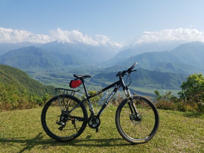 Bike in front of mountains