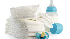 Diapers with a baby bottle and binky