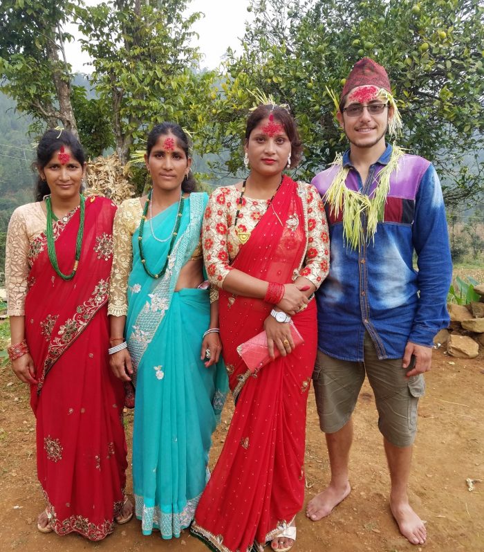 Nepal Mans FAmily dressed in tradition clothes