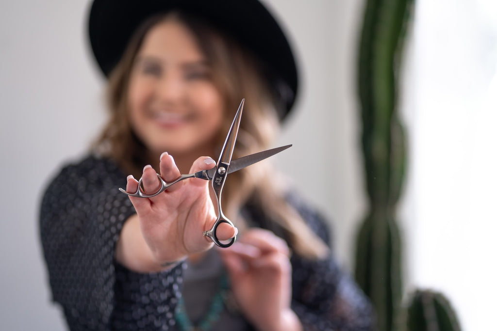 Woman holding Hair sheers