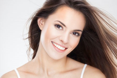 Woman with long hair smiling