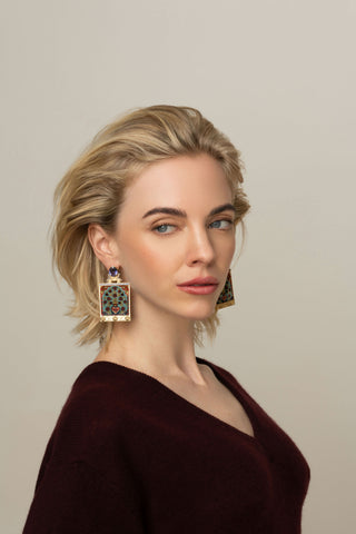 woman wearing Silvia Furmanovich earrings