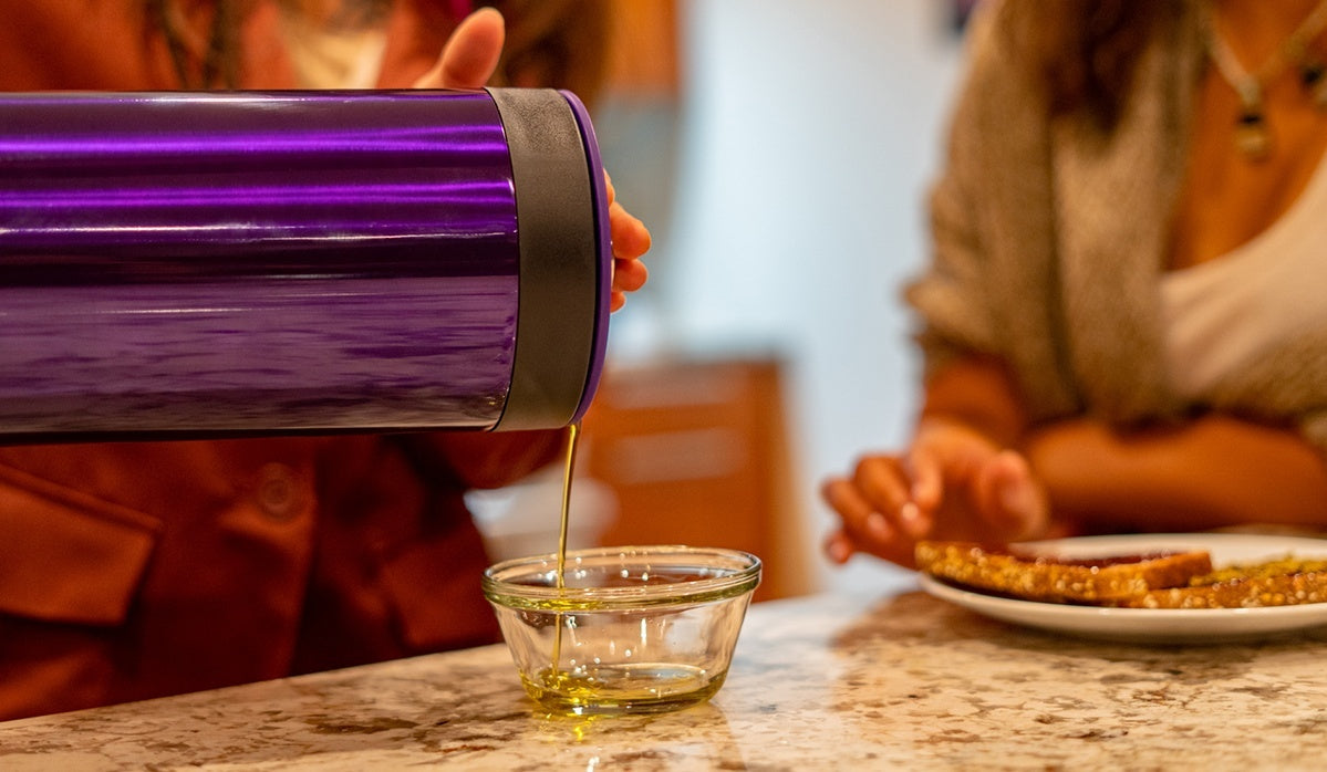 Pouring cannabis-infused oil out of the FX