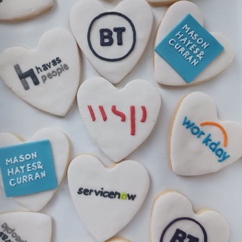 Branded heart shaped hand iced logo biscuits