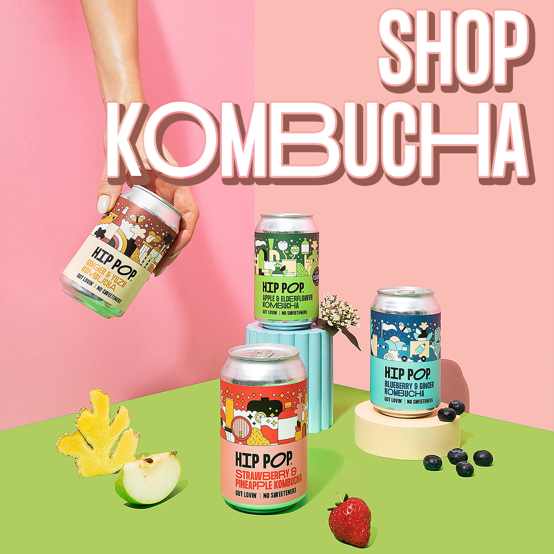 Hip Pop Kombucha collection with one hand grabbing a can of kombucha