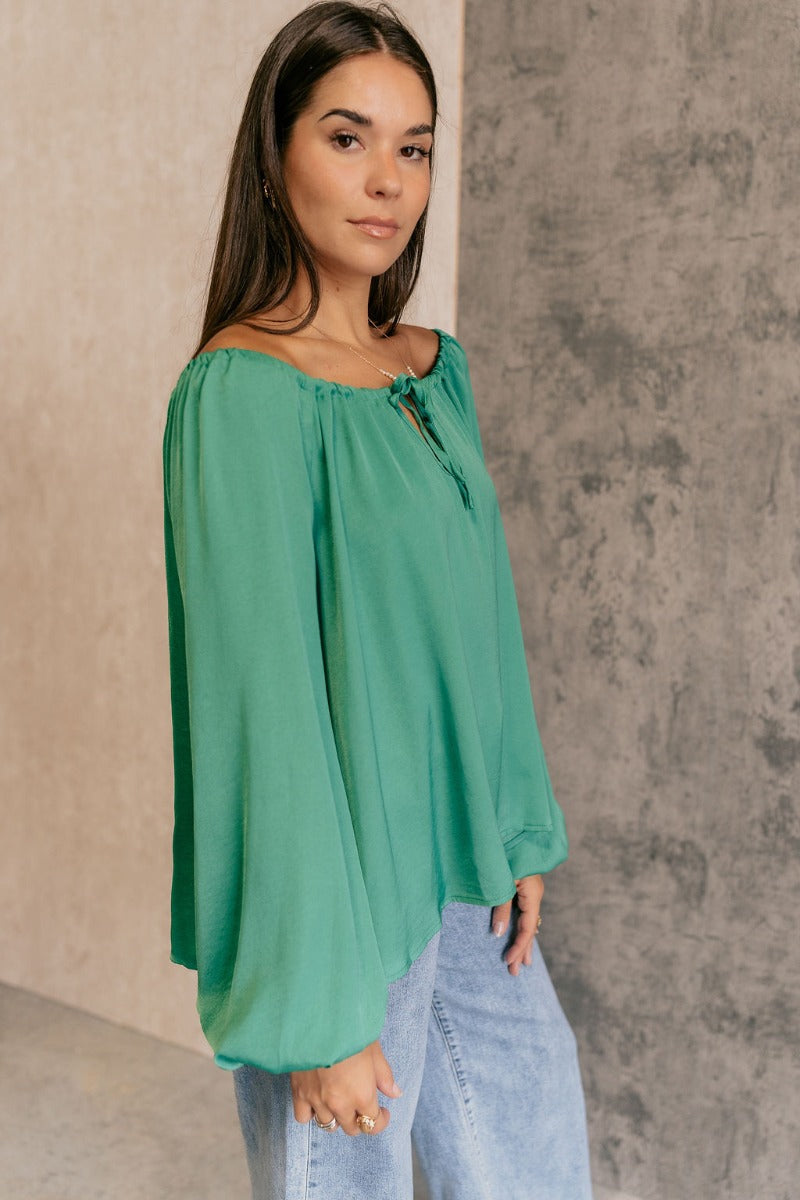 Ruffled top with adjustable drawstring