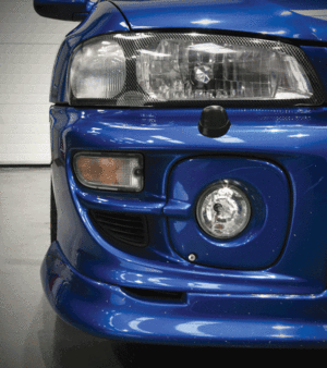 blue car bumper close up 