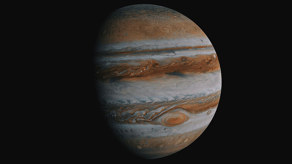 A highly detailed image of the planet Jupiter, showcasing its swirling storms and bands of clouds, representing the astrological influence during the full moon phase.