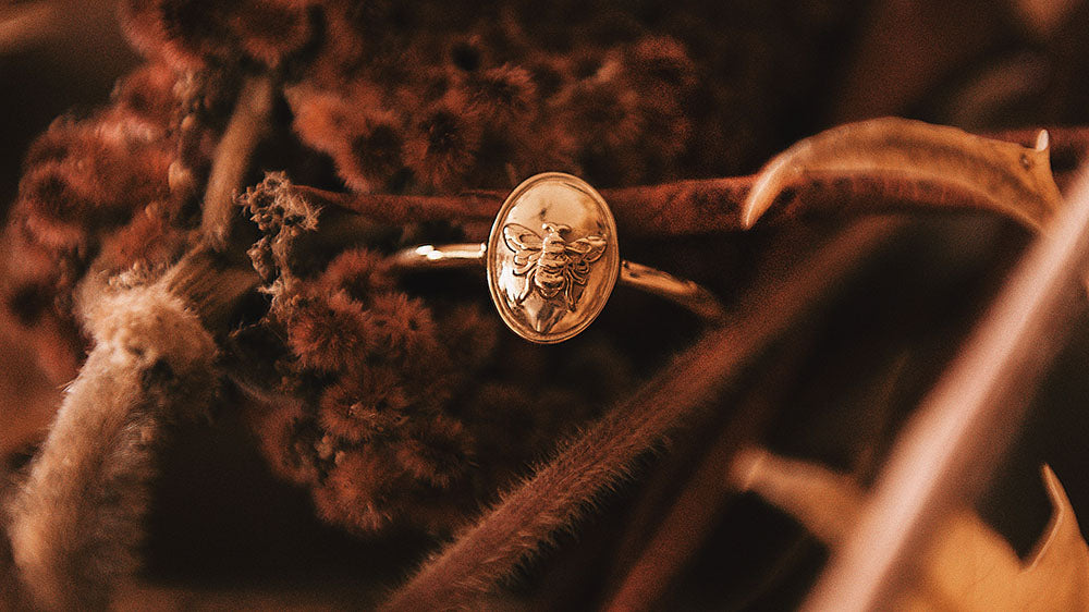 Close-up of fiery amber jewelry, the kind of adornment that could be associated with Freyja’s fiery and passionate nature.