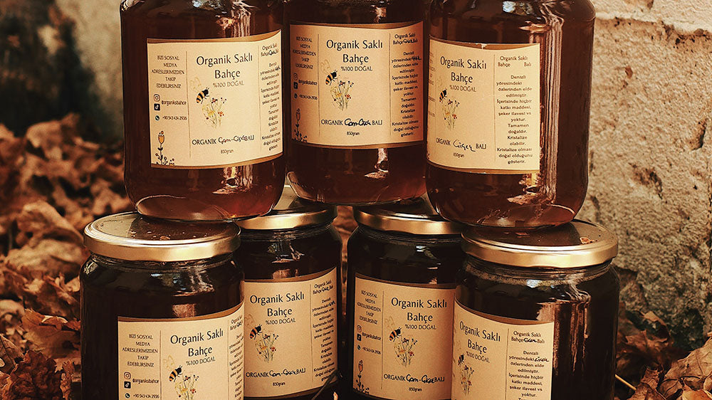 Jars of honey lined up, symbolizing offerings to Freyja, reflecting her sweetness and connection to natural abundance.