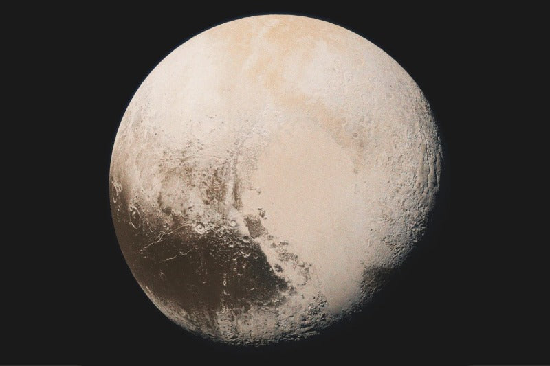 The Dwarf Planet Pluto who rules over change in astrology sits regally against the shadowy vacuum of space