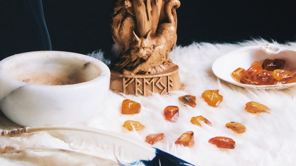 An altar dedicated to the Norse goddess of love, war, and magic Freyja showcasing amber runes
