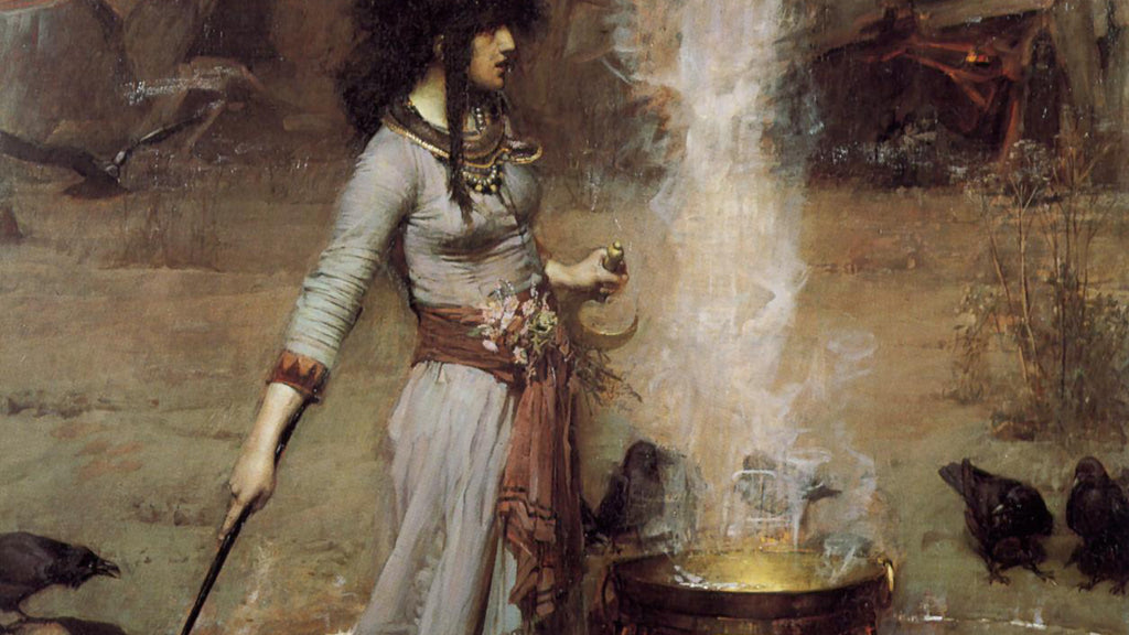 The painting 'The Magic Circle' by John William Waterhouse, depicting a sorceress performing a ritual within a circle, likely representing the goddess Hekate. She holds a staff and a small flame in her hands, while smoke rises from a cauldron at her feet, surrounded by crows—a scene symbolizing Hekate's association with witchcraft and her command over the mystical arts.