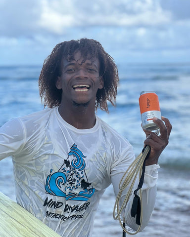 Alexander De La Cruz, professional surfer and our instructor about to enjoy a post-surf Extra Mile