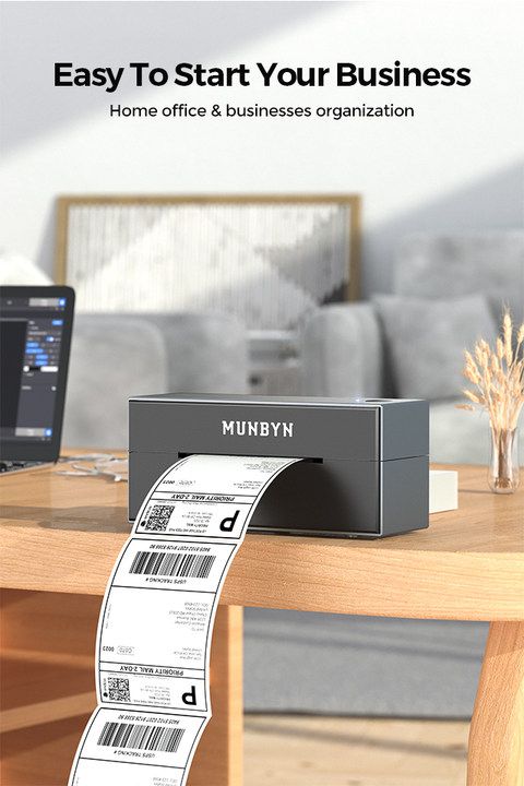 MUNBYN P129 Bluetooth printer is printing a shipping label.