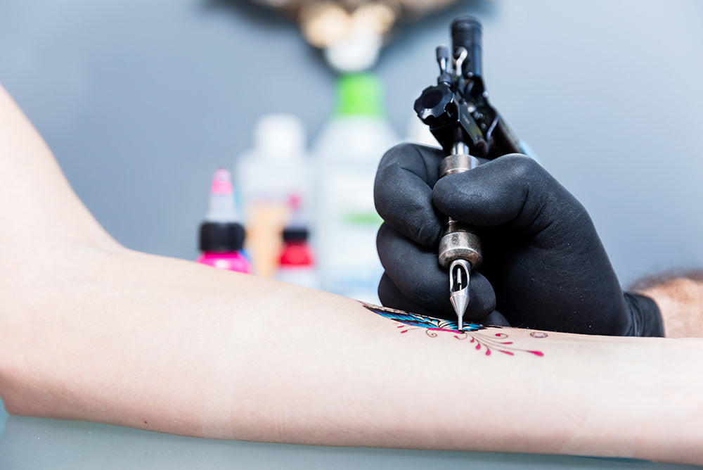Tattoo Waxing Does Hair Grow Over Tattoos  Maryann Organics