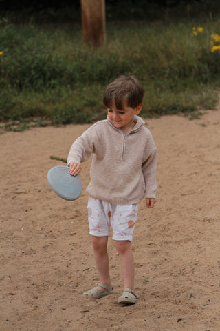 Easter toys: boy playing with Silicone Frisbee