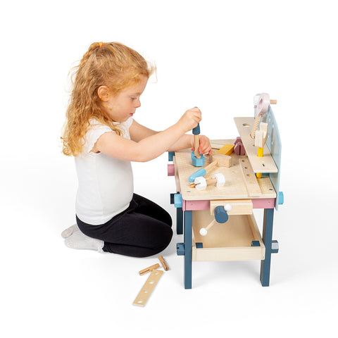 Child playing with Kids Tool Bench