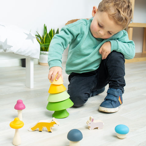 Easter toys: boy playing with Forest Friends Playset