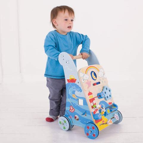 Boy playing with Marine Activity baby walker