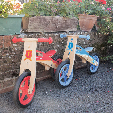 Ride on toys: Two Kids Balance Bikes leaning on a wall