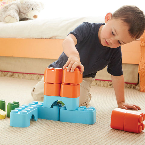 Boy playing with Green Toys Block Set