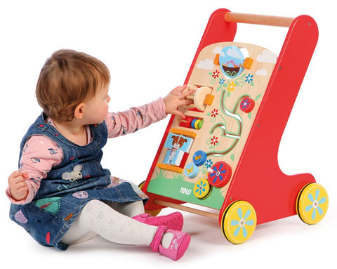 Girl playing with Tidlo Wooden Baby Walker