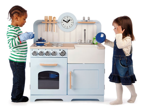 Children playing with the Country Kitchen Christmas gift