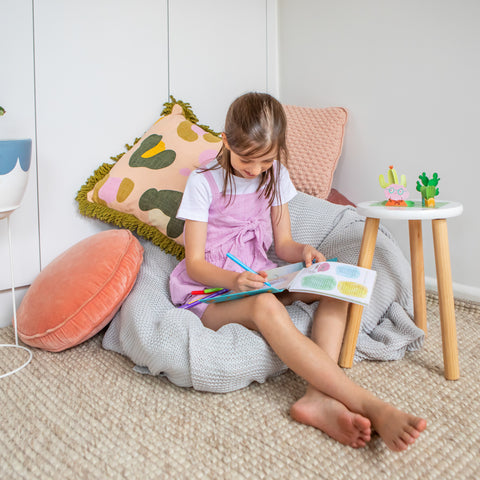 Girl playing with Mindfulness Colouring Set