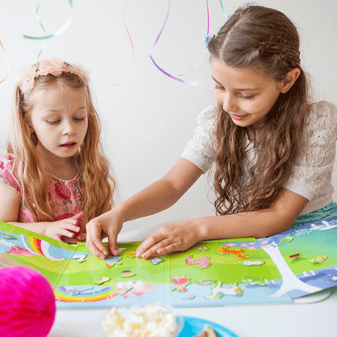 Two girls playing with Unicorn Toy Magnet Set