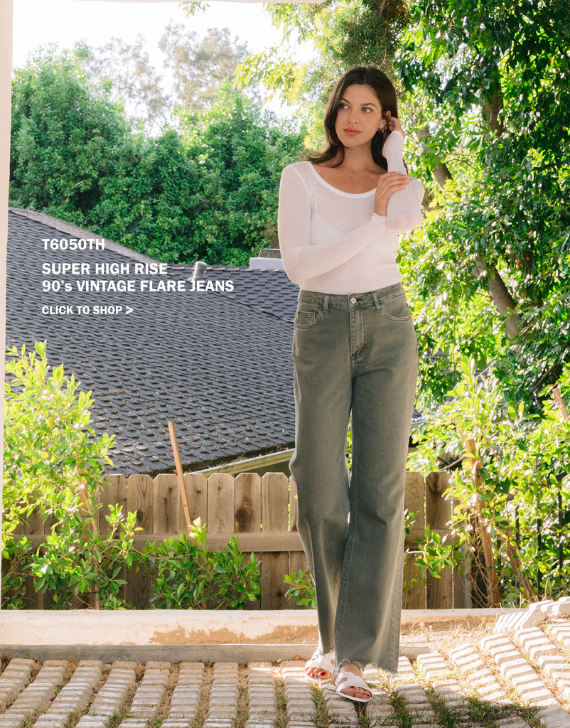 editorial image of Thyme - Super High Rise 90's Vintage Hem Detail Flare Jeans