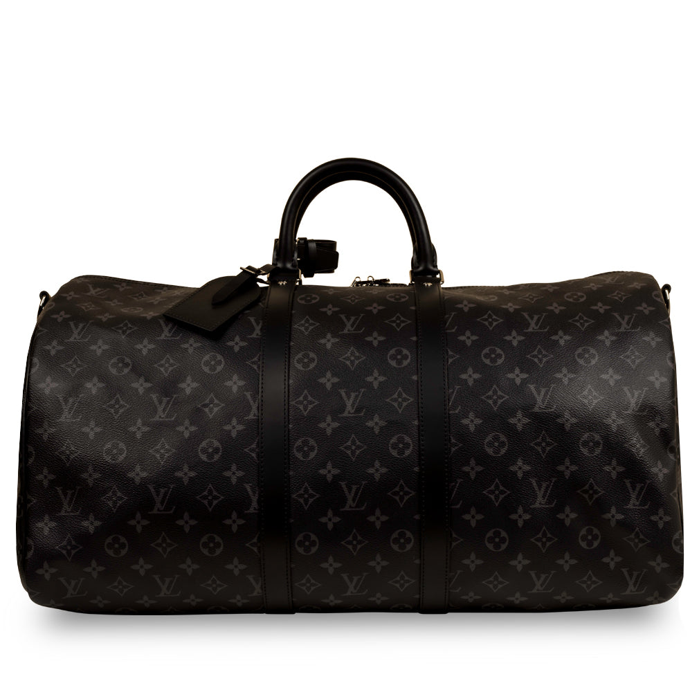 A LIMITED EDITION WHITE MONOGRAM CANVAS NBA BASKETBALL KEEPALL WITH GOLD  HARDWARE