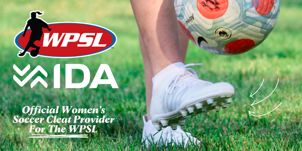WPSL and IDA logos positioned to the left of a female soccer player juggling a soccer ball while wearing the IDA Rise all white women's soccer cleats. 