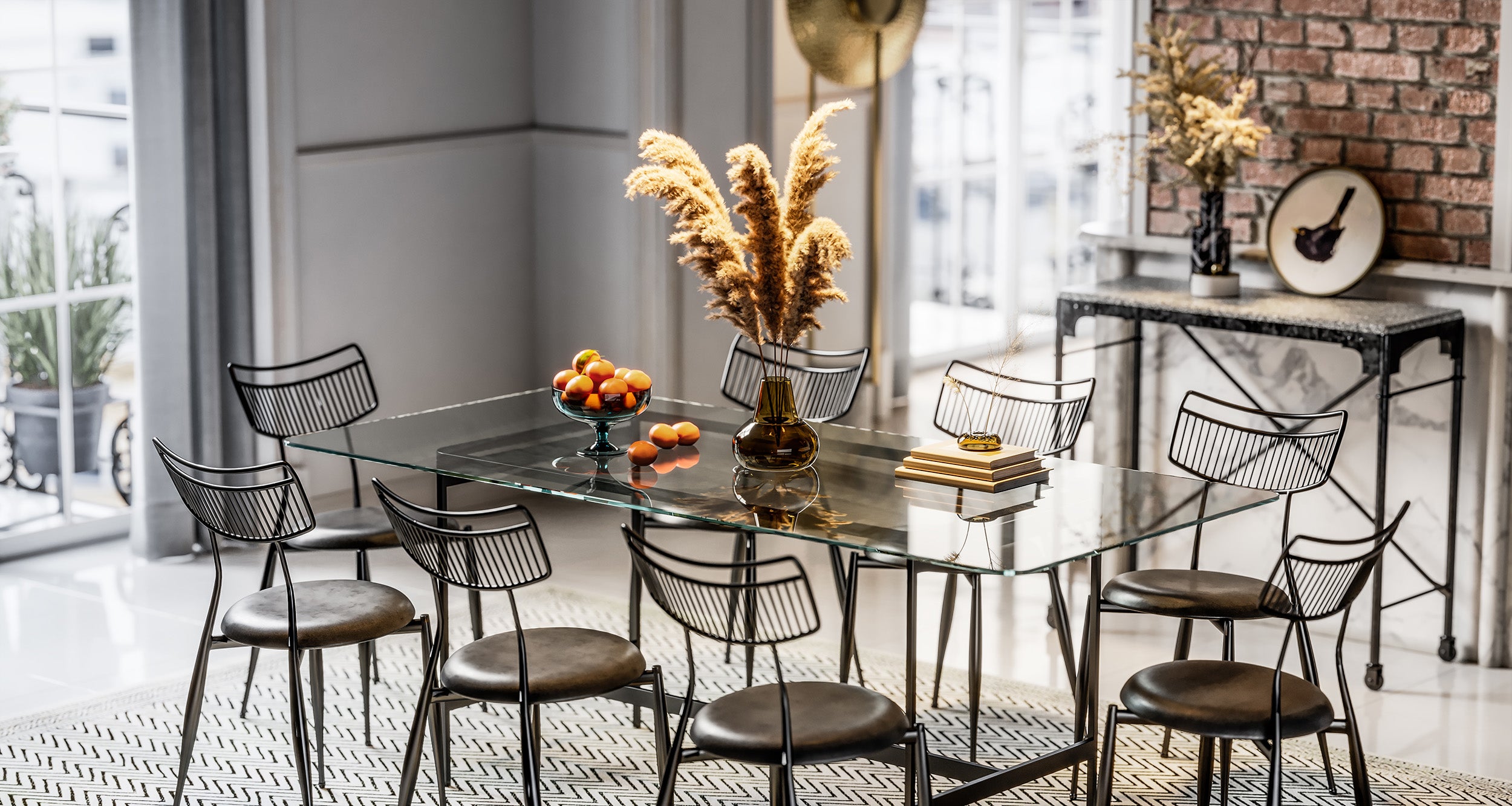 Rectangle clear glass table on black metal base with eight metal chairs fitted with brown leather seat cushions