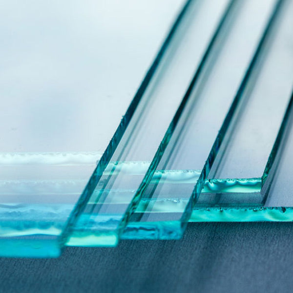 Five pieces of glass stacked with close up of edges