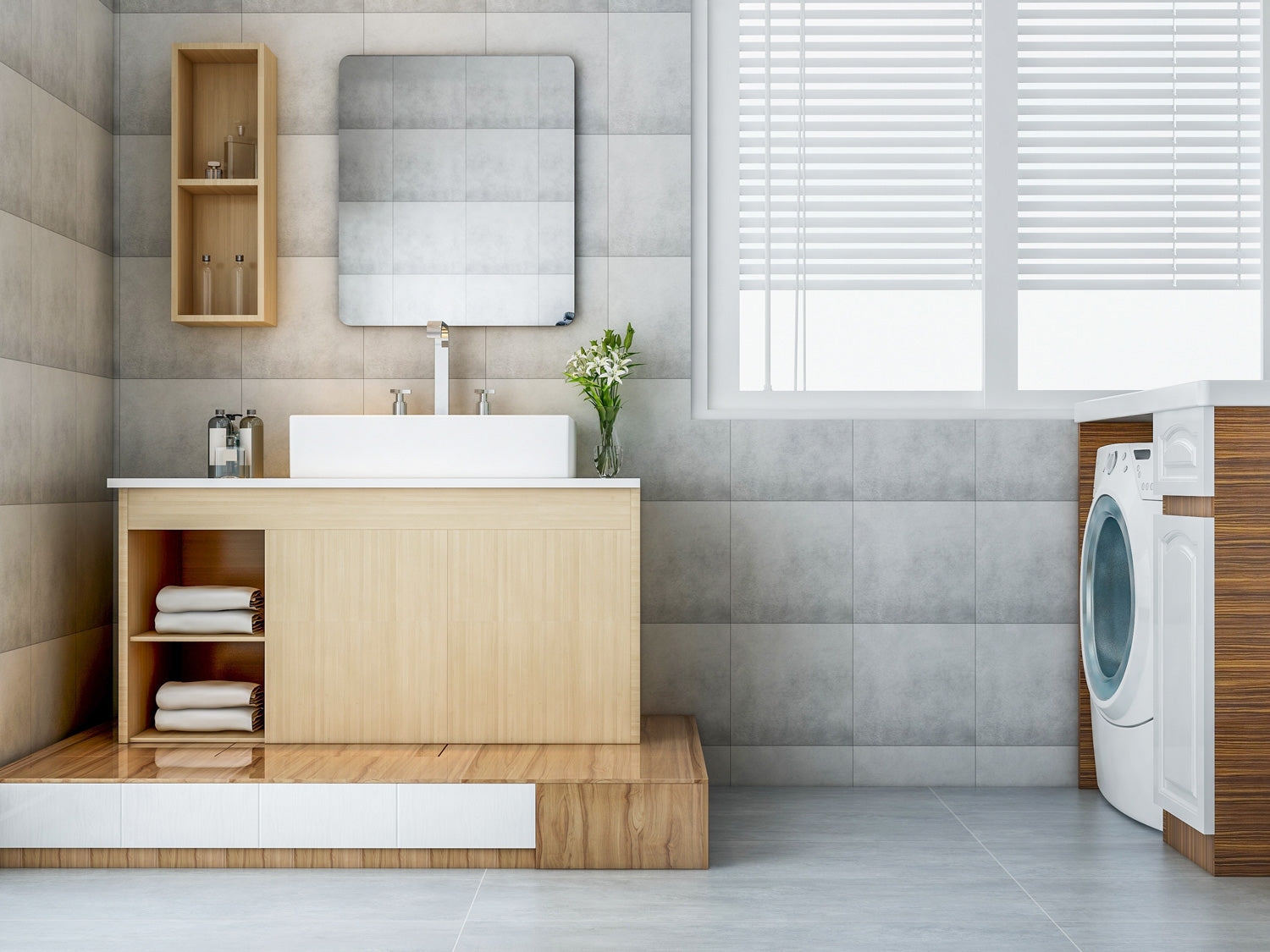 Square frameless mirror with round corners over light wood vanity on top of wood platform