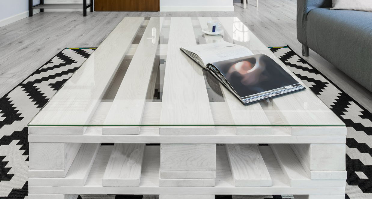 Rectangle glass table protector on white wood coffee table