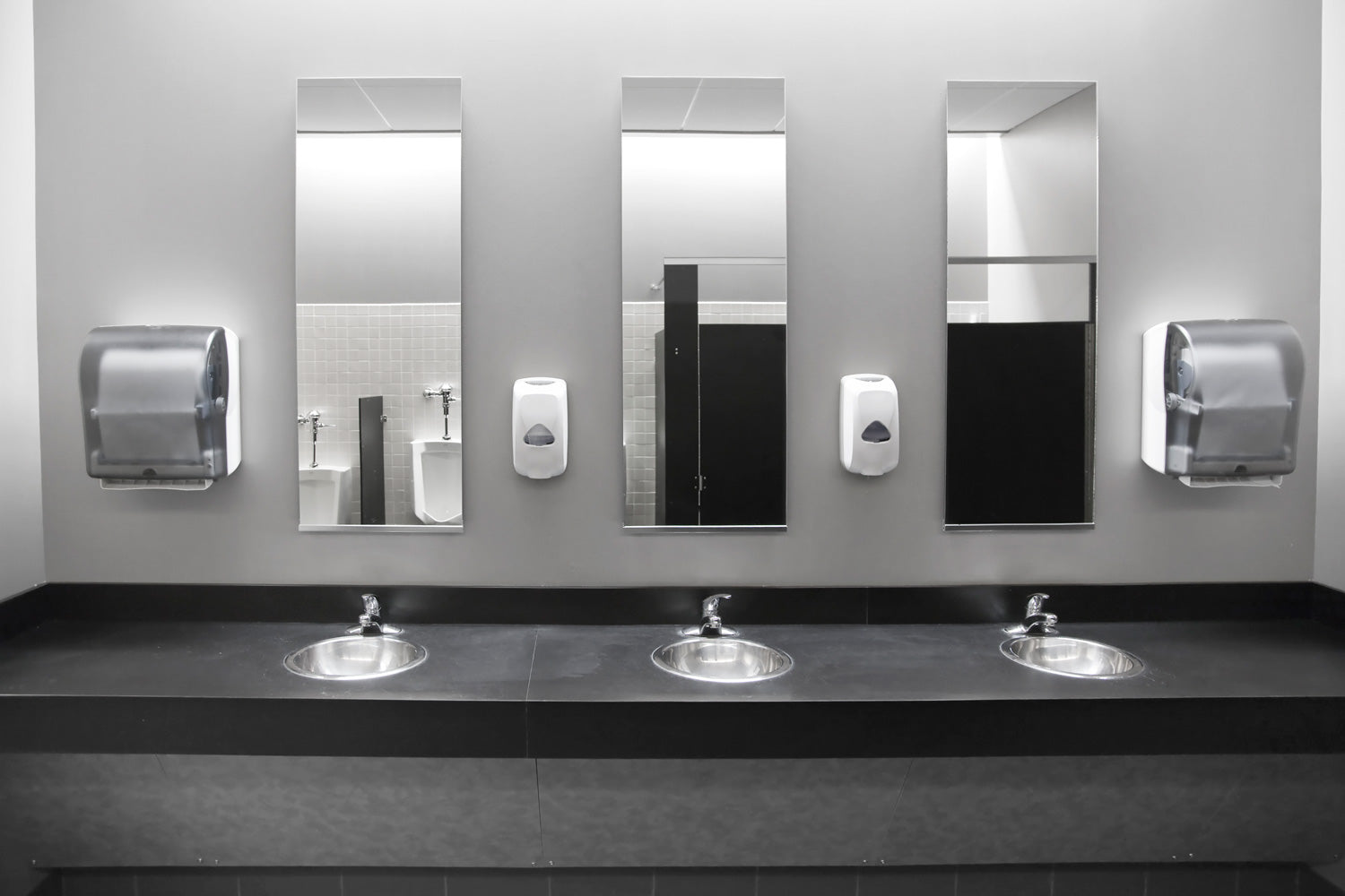 Three Rectangle Frameless Mirrors In Public Bathroom
