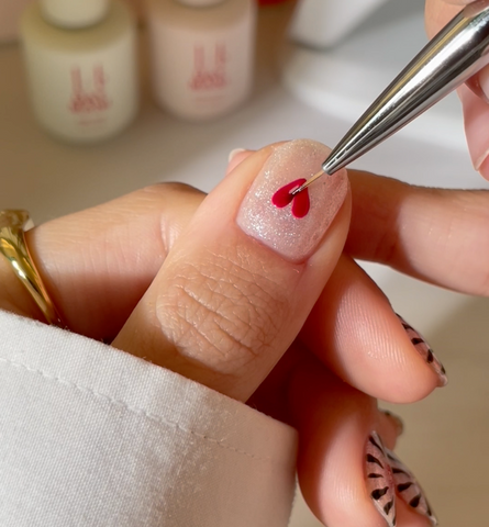 Complete red heart applied to nail with Nail Art Liner Brush