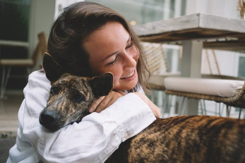 woman hugging her goodboye