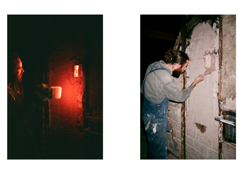 Gus checking the cones in the wood fire kiln