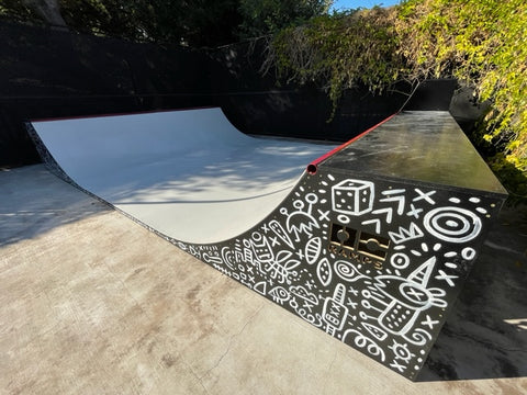 OC Ramps 16 ft wide Half Pipe Painted Black with Custom Artwork