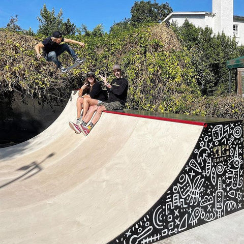 TomTom doing a skate demo for new ramp for Tiffani Theissen and Brady Smith