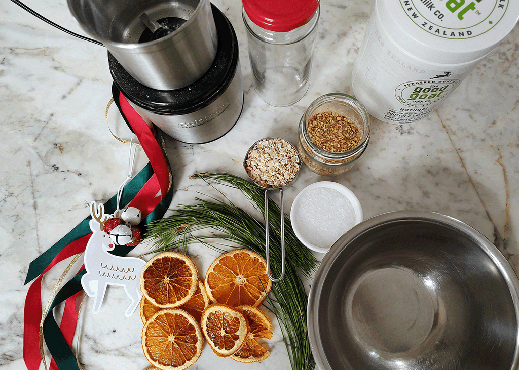 Ingredients for Goat milk foot soak: Epsom salts, dried orange, dried orange slices, oats, container of Good Goat Milk Co Natural Milk Powder