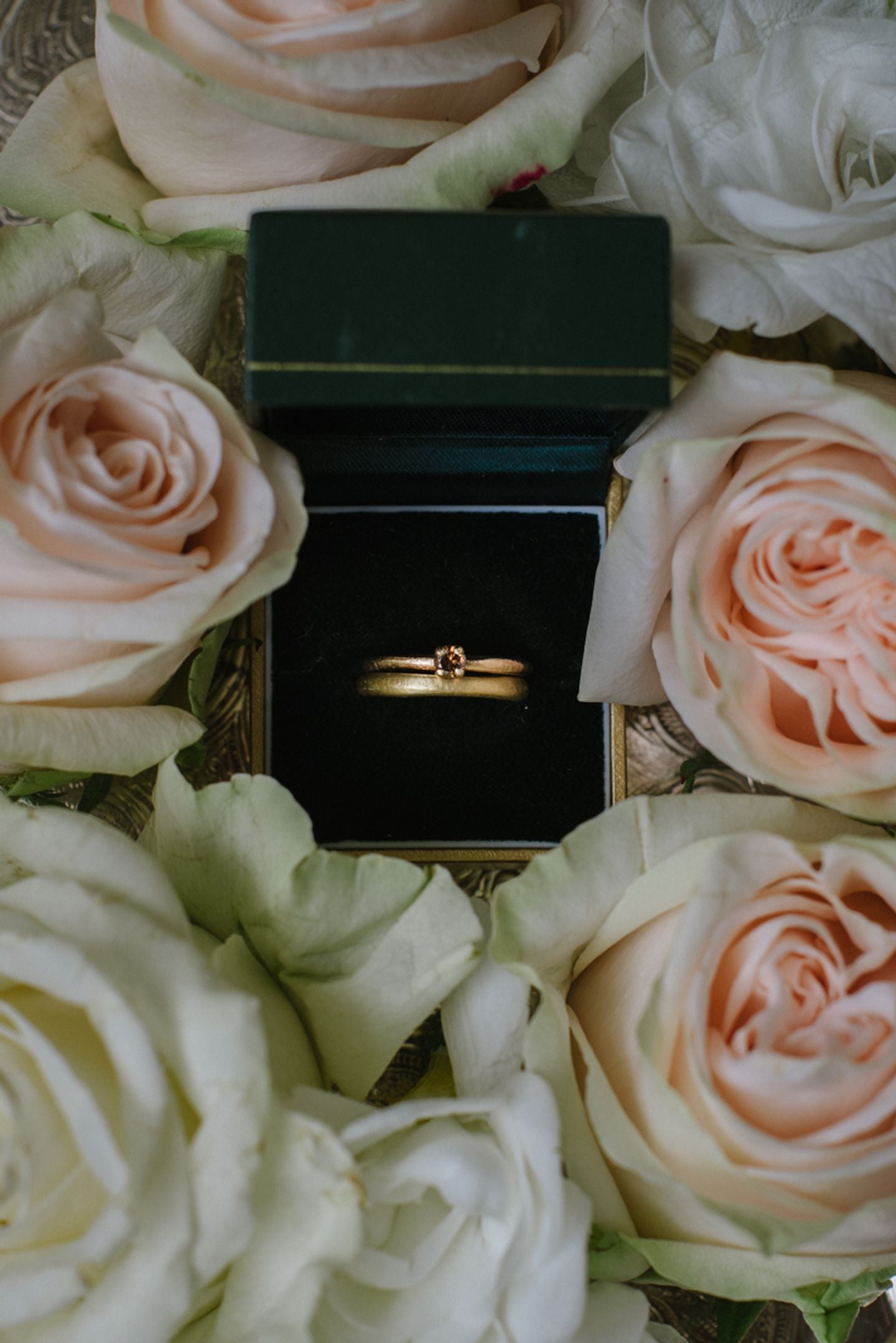 Yellow gold and brown diamond bridal ring set, vintage ring box and roses