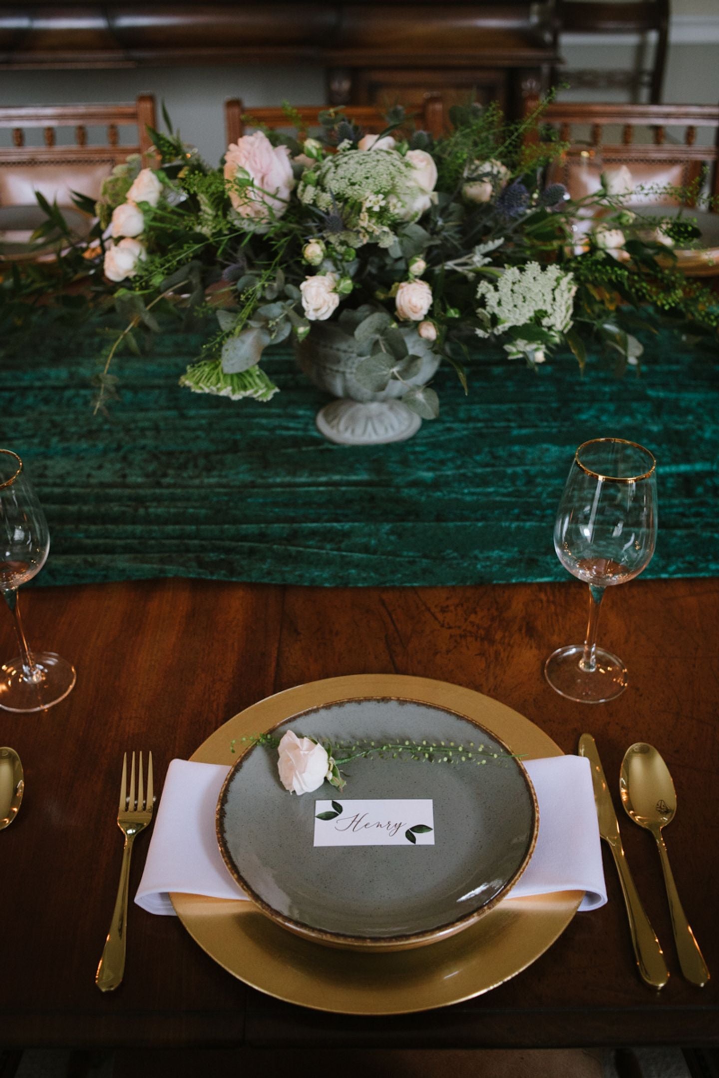 Country house table setting, rich forest green table dressing, wild flowers and hand written place cards