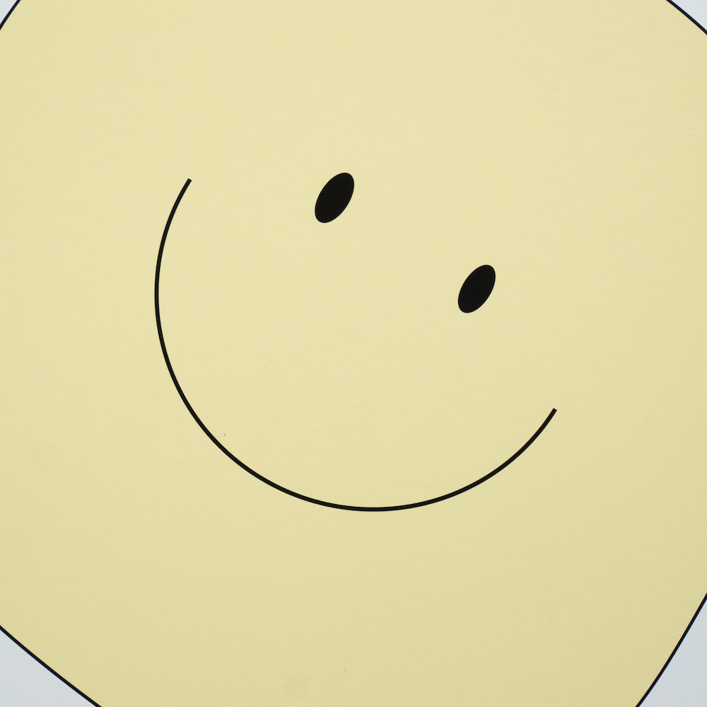 A simple yellow smiley face on a white background.