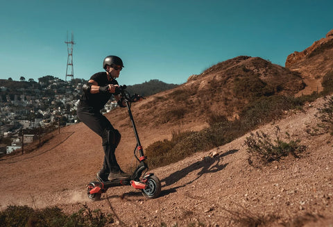 Electric Scooter Climbing a Hill