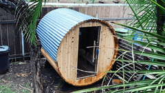 Barrel Sauna with metal corrugated roof